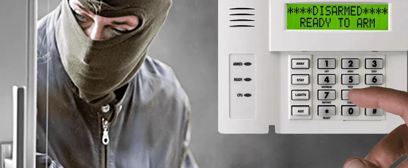 Intruder alarm keypad in use